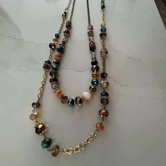Jewelry - Pair of necklaces, warm gold tones with faceted glass beads
